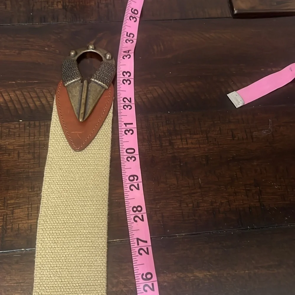 Omega Made in the USA utility belt with brass, leather, and arrowhead closure